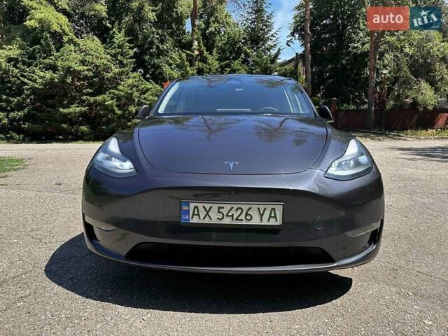 Серый Тесла Model Y, объемом двигателя 0 л и пробегом 19 тыс. км за 32500 $, фото 2 на Automoto.ua