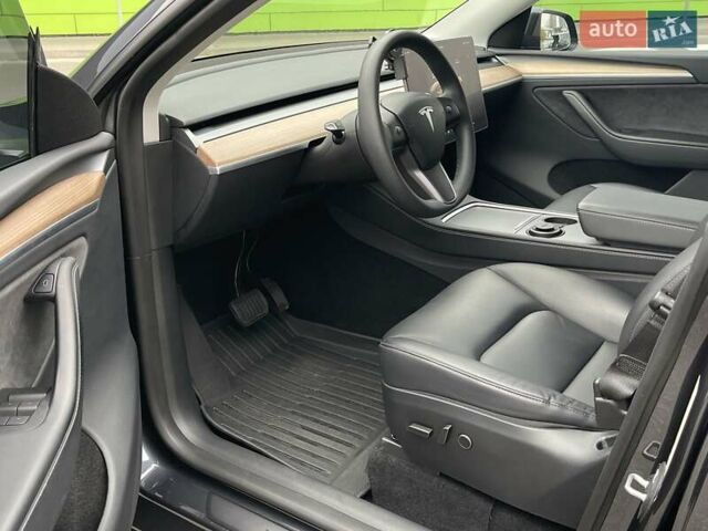 Серый Тесла Model Y, объемом двигателя 0 л и пробегом 22 тыс. км за 34700 $, фото 18 на Automoto.ua
