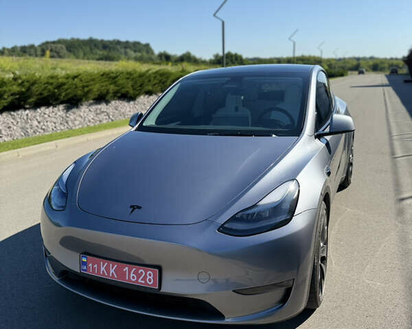 Серый Тесла Model Y, объемом двигателя 0 л и пробегом 11 тыс. км за 33900 $, фото 1 на Automoto.ua