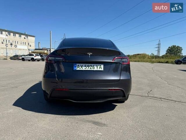 Серый Тесла Model Y, объемом двигателя 0 л и пробегом 22 тыс. км за 30900 $, фото 4 на Automoto.ua