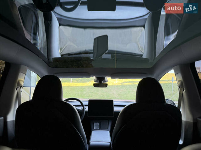 Серый Тесла Model Y, объемом двигателя 0 л и пробегом 23 тыс. км за 29800 $, фото 31 на Automoto.ua