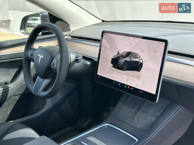 Серый Тесла Model Y, объемом двигателя 0 л и пробегом 1 тыс. км за 35490 $, фото 47 на Automoto.ua