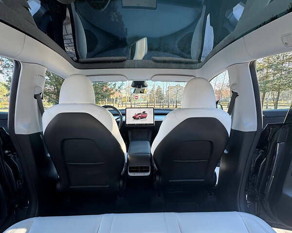 Серый Тесла Model Y, объемом двигателя 0 л и пробегом 9 тыс. км за 29500 $, фото 83 на Automoto.ua