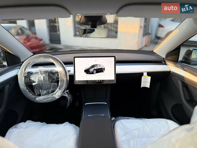 Серый Тесла Model Y, объемом двигателя 0 л и пробегом 1 тыс. км за 39900 $, фото 29 на Automoto.ua