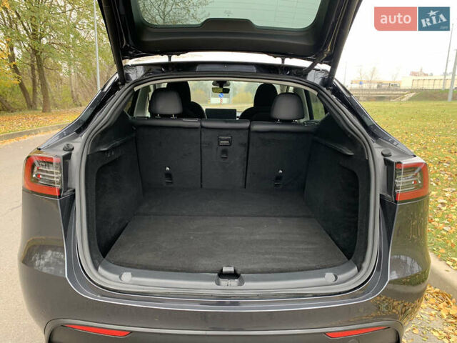 Серый Тесла Model Y, объемом двигателя 0 л и пробегом 14 тыс. км за 32300 $, фото 24 на Automoto.ua