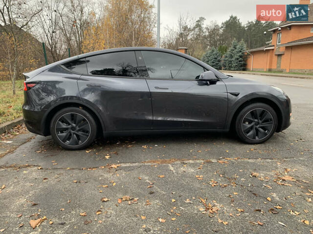 Серый Тесла Model Y, объемом двигателя 0 л и пробегом 35 тыс. км за 32900 $, фото 1 на Automoto.ua