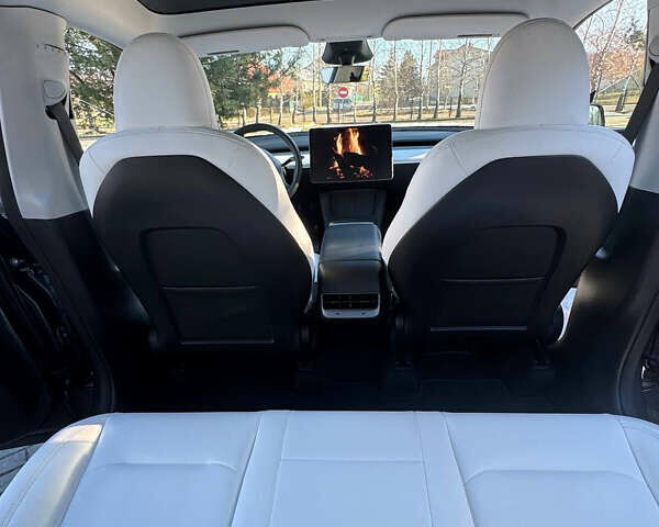 Серый Тесла Model Y, объемом двигателя 0 л и пробегом 9 тыс. км за 29500 $, фото 55 на Automoto.ua