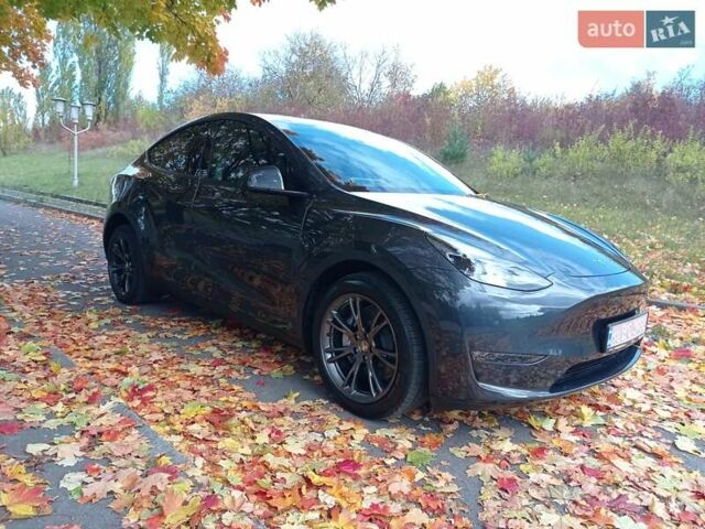 Серый Тесла Model Y, объемом двигателя 0 л и пробегом 7 тыс. км за 30800 $, фото 1 на Automoto.ua