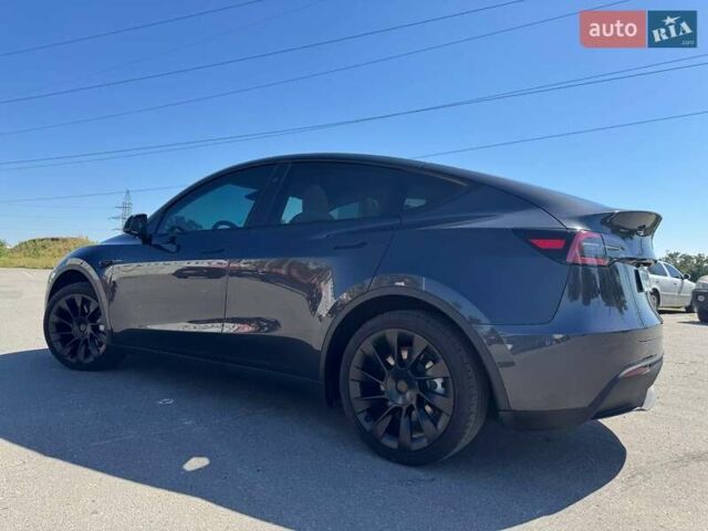 Серый Тесла Model Y, объемом двигателя 0 л и пробегом 22 тыс. км за 30900 $, фото 3 на Automoto.ua