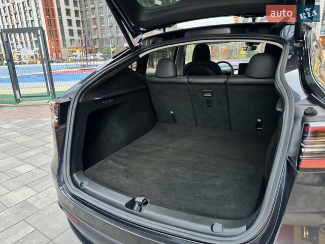 Сірий Тесла Model Y, об'ємом двигуна 0 л та пробігом 27 тис. км за 30900 $, фото 20 на Automoto.ua