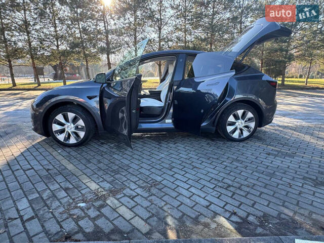 Серый Тесла Model Y, объемом двигателя 0 л и пробегом 9 тыс. км за 29500 $, фото 49 на Automoto.ua