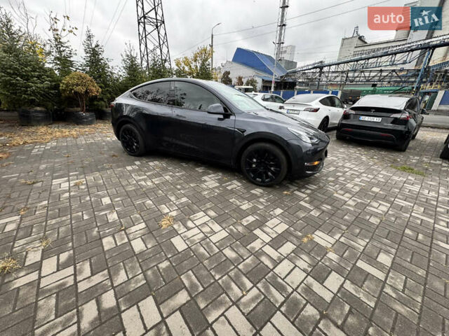 Серый Тесла Model Y, объемом двигателя 0 л и пробегом 8 тыс. км за 31999 $, фото 4 на Automoto.ua