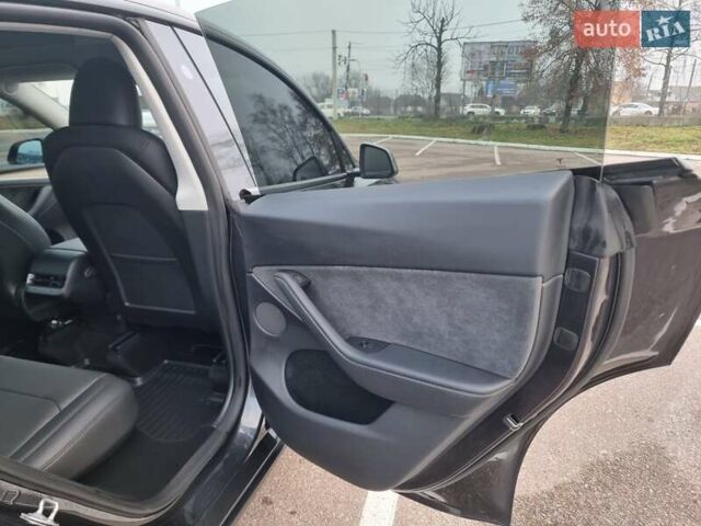 Серый Тесла Model Y, объемом двигателя 0 л и пробегом 24 тыс. км за 30900 $, фото 20 на Automoto.ua