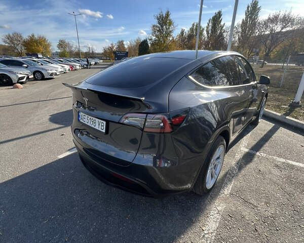 Серый Тесла Model Y, объемом двигателя 0 л и пробегом 40 тыс. км за 29900 $, фото 2 на Automoto.ua
