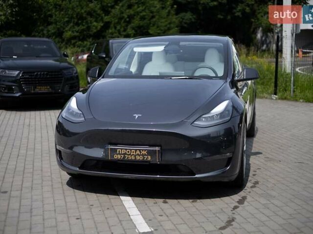 Серый Тесла Model Y, объемом двигателя 0 л и пробегом 24 тыс. км за 29500 $, фото 5 на Automoto.ua