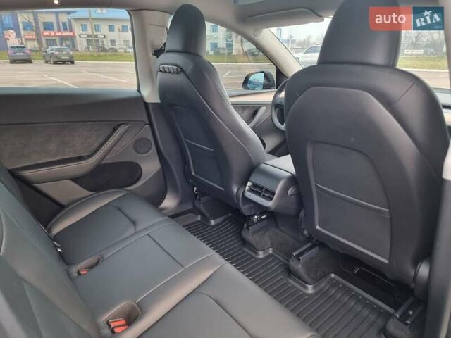 Серый Тесла Model Y, объемом двигателя 0 л и пробегом 24 тыс. км за 30900 $, фото 18 на Automoto.ua