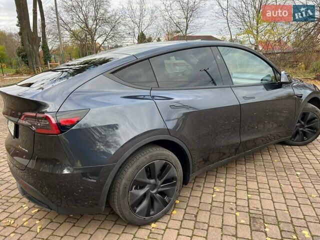 Серый Тесла Model Y, объемом двигателя 0 л и пробегом 4 тыс. км за 29900 $, фото 5 на Automoto.ua