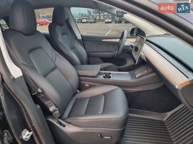 Серый Тесла Model Y, объемом двигателя 0 л и пробегом 24 тыс. км за 30900 $, фото 24 на Automoto.ua