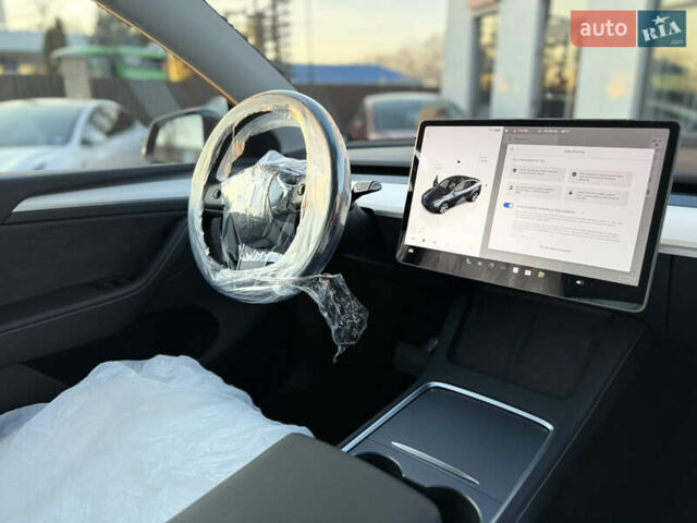 Серый Тесла Model Y, объемом двигателя 0 л и пробегом 1 тыс. км за 39900 $, фото 28 на Automoto.ua
