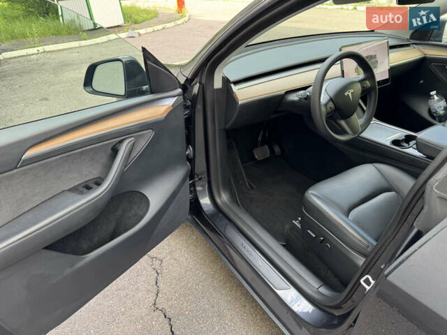 Серый Тесла Model Y, объемом двигателя 0 л и пробегом 14 тыс. км за 33500 $, фото 9 на Automoto.ua