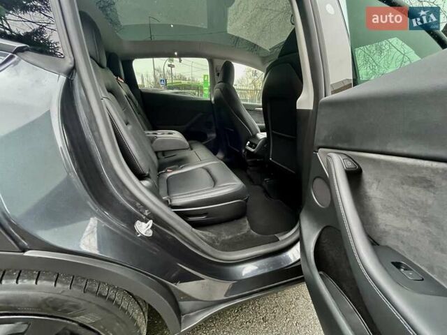Серый Тесла Model Y, объемом двигателя 0 л и пробегом 23 тыс. км за 28800 $, фото 24 на Automoto.ua
