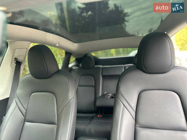 Серый Тесла Model Y, объемом двигателя 0 л и пробегом 26 тыс. км за 31700 $, фото 11 на Automoto.ua