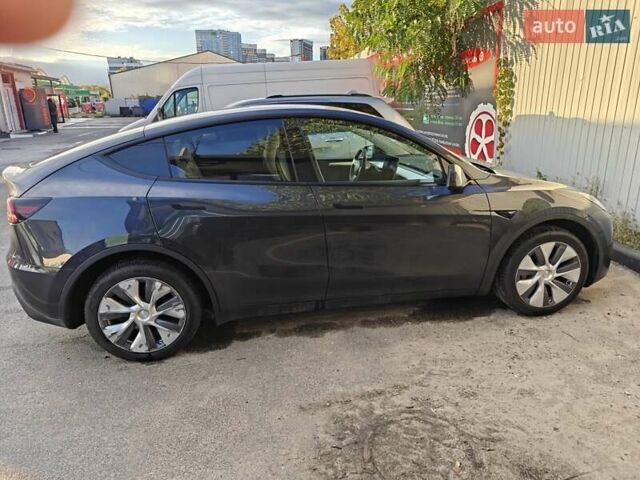 Серый Тесла Model Y, объемом двигателя 0 л и пробегом 21 тыс. км за 34000 $, фото 2 на Automoto.ua