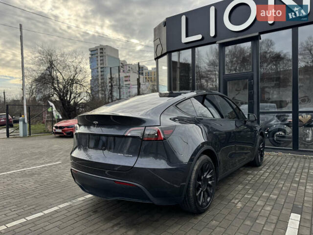 Сірий Тесла Model Y, об'ємом двигуна 0 л та пробігом 31 тис. км за 24499 $, фото 6 на Automoto.ua
