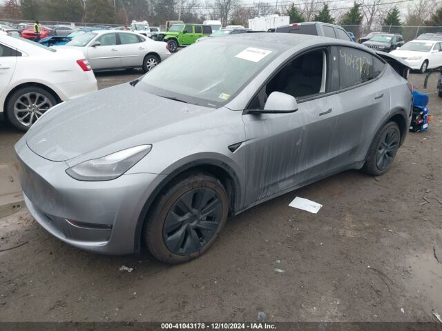 Серый Тесла Model Y, объемом двигателя 0 л и пробегом 6 тыс. км за 25500 $, фото 2 на Automoto.ua
