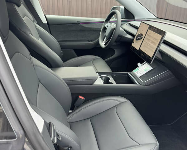 Серый Тесла Model Y, объемом двигателя 0 л и пробегом 2 тыс. км за 62500 $, фото 5 на Automoto.ua