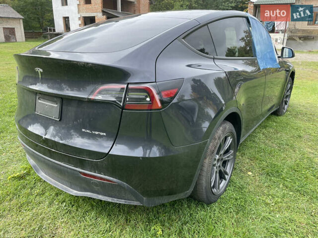 Серый Тесла Model Y, объемом двигателя 0 л и пробегом 7 тыс. км за 23900 $, фото 4 на Automoto.ua