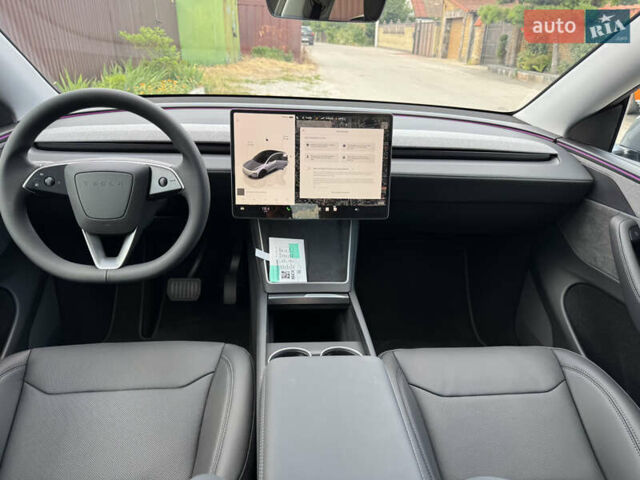 Серый Тесла Model Y, объемом двигателя 0 л и пробегом 2 тыс. км за 62500 $, фото 3 на Automoto.ua