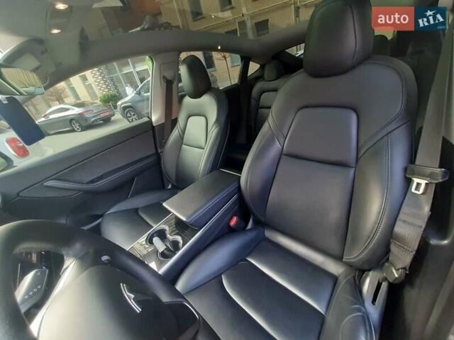 Серый Тесла Model Y, объемом двигателя 0 л и пробегом 130 тыс. км за 20800 $, фото 8 на Automoto.ua