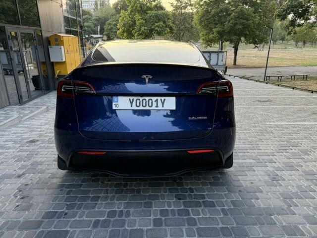 Синий Тесла Model Y, объемом двигателя 0 л и пробегом 45 тыс. км за 32500 $, фото 2 на Automoto.ua