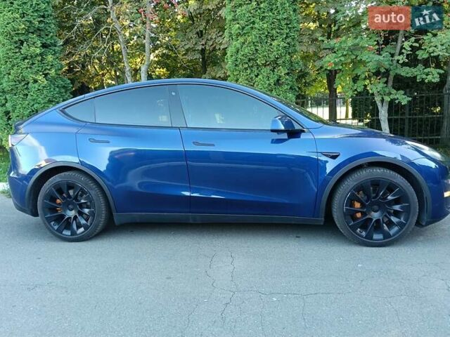 Синій Тесла Model Y, об'ємом двигуна 0 л та пробігом 65 тис. км за 23200 $, фото 6 на Automoto.ua