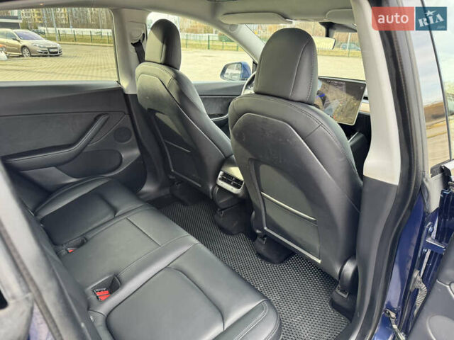Синий Тесла Model Y, объемом двигателя 0 л и пробегом 83 тыс. км за 23800 $, фото 28 на Automoto.ua