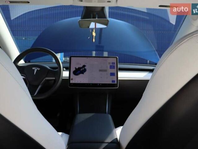 Синий Тесла Model Y, объемом двигателя 0 л и пробегом 70 тыс. км за 25500 $, фото 28 на Automoto.ua