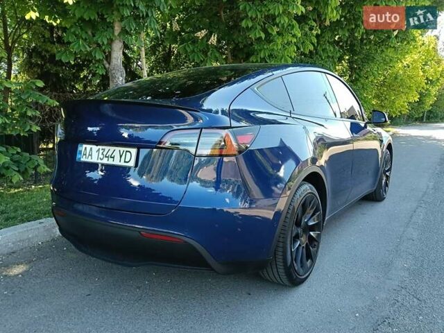 Синий Тесла Model Y, объемом двигателя 0 л и пробегом 65 тыс. км за 25000 $, фото 3 на Automoto.ua