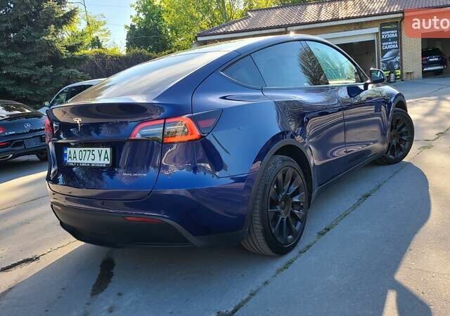 Синій Тесла Model Y, об'ємом двигуна 0 л та пробігом 110 тис. км за 24900 $, фото 3 на Automoto.ua