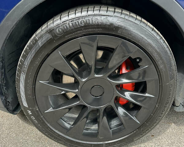 Синий Тесла Model Y, объемом двигателя 0 л и пробегом 57 тыс. км за 22900 $, фото 33 на Automoto.ua