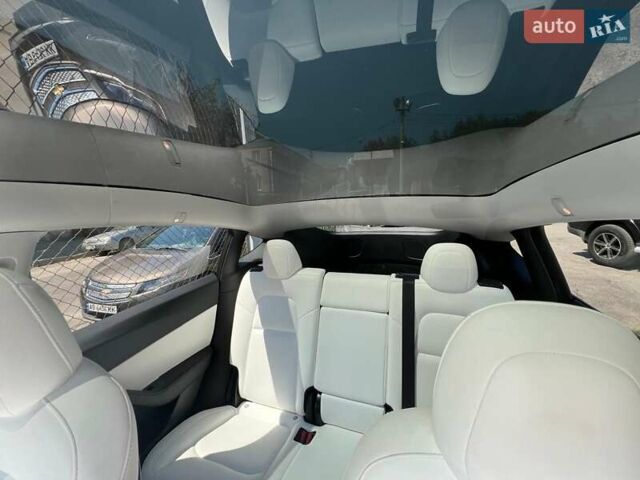 Синий Тесла Model Y, объемом двигателя 0 л и пробегом 70 тыс. км за 25500 $, фото 13 на Automoto.ua