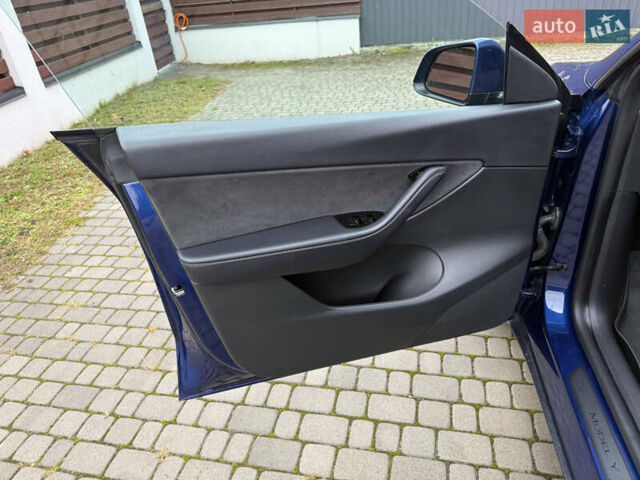 Синий Тесла Model Y, объемом двигателя 0 л и пробегом 145 тыс. км за 20700 $, фото 7 на Automoto.ua