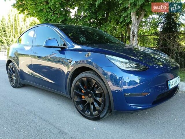 Синий Тесла Model Y, объемом двигателя 0 л и пробегом 65 тыс. км за 25000 $, фото 1 на Automoto.ua