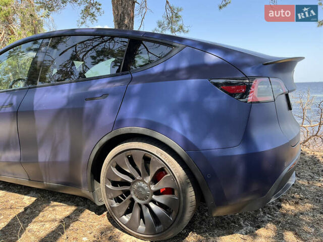 Синий Тесла Model Y, объемом двигателя 0 л и пробегом 75 тыс. км за 25000 $, фото 5 на Automoto.ua