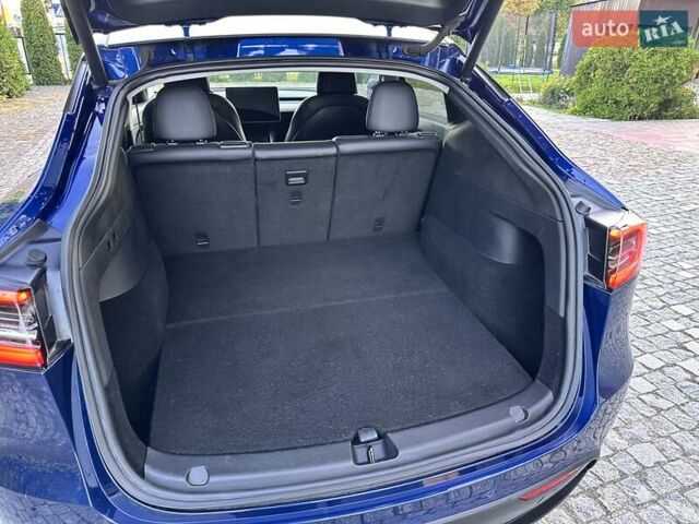 Синій Тесла Model Y, об'ємом двигуна 0 л та пробігом 163 тис. км за 20900 $, фото 26 на Automoto.ua