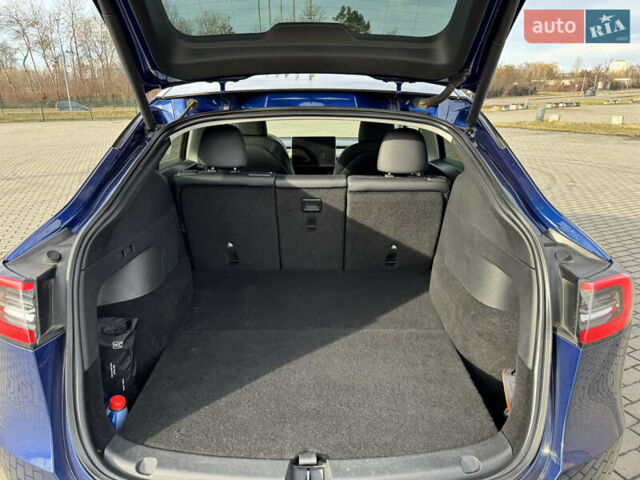 Синий Тесла Model Y, объемом двигателя 0 л и пробегом 83 тыс. км за 23800 $, фото 26 на Automoto.ua