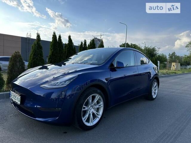 Синий Тесла Model Y, объемом двигателя 0 л и пробегом 58 тыс. км за 26900 $, фото 1 на Automoto.ua