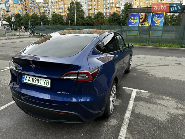 Синій Тесла Model Y, об'ємом двигуна 0 л та пробігом 82 тис. км за 26500 $, фото 4 на Automoto.ua