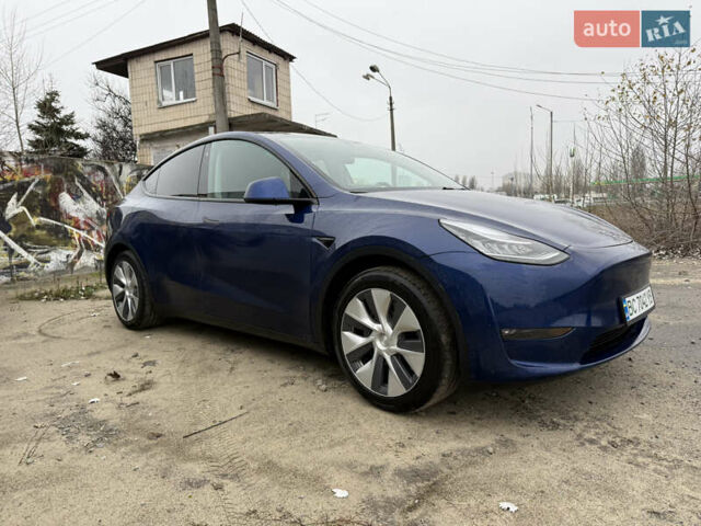 Синий Тесла Model Y, объемом двигателя 0 л и пробегом 100 тыс. км за 21400 $, фото 1 на Automoto.ua