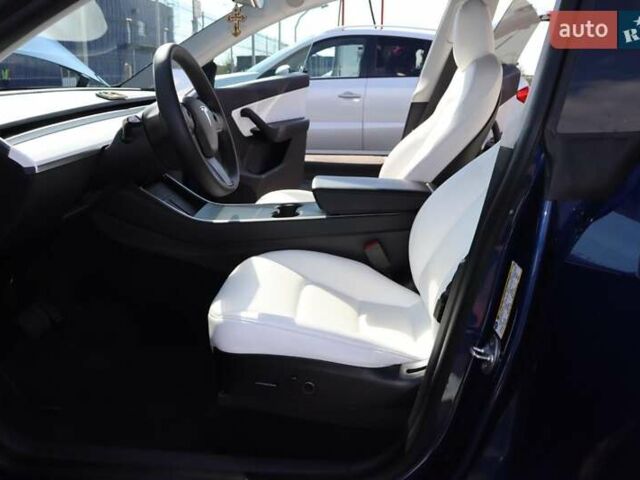 Синий Тесла Model Y, объемом двигателя 0 л и пробегом 70 тыс. км за 25500 $, фото 37 на Automoto.ua